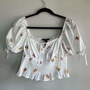 White top with flower embroidery and smocked detailing size large